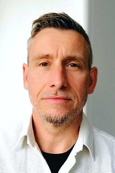 A close up portrait of Colin Guilford.