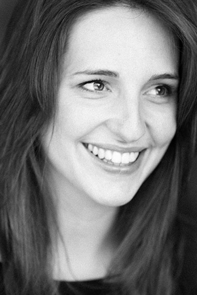 A close up black and white portrait of Laura Howells Green.