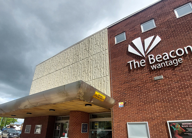 A long shot of the outside of The Beacon building.