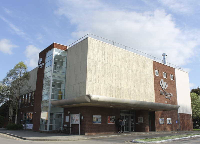 A long shot of the outside of the Beacon building.