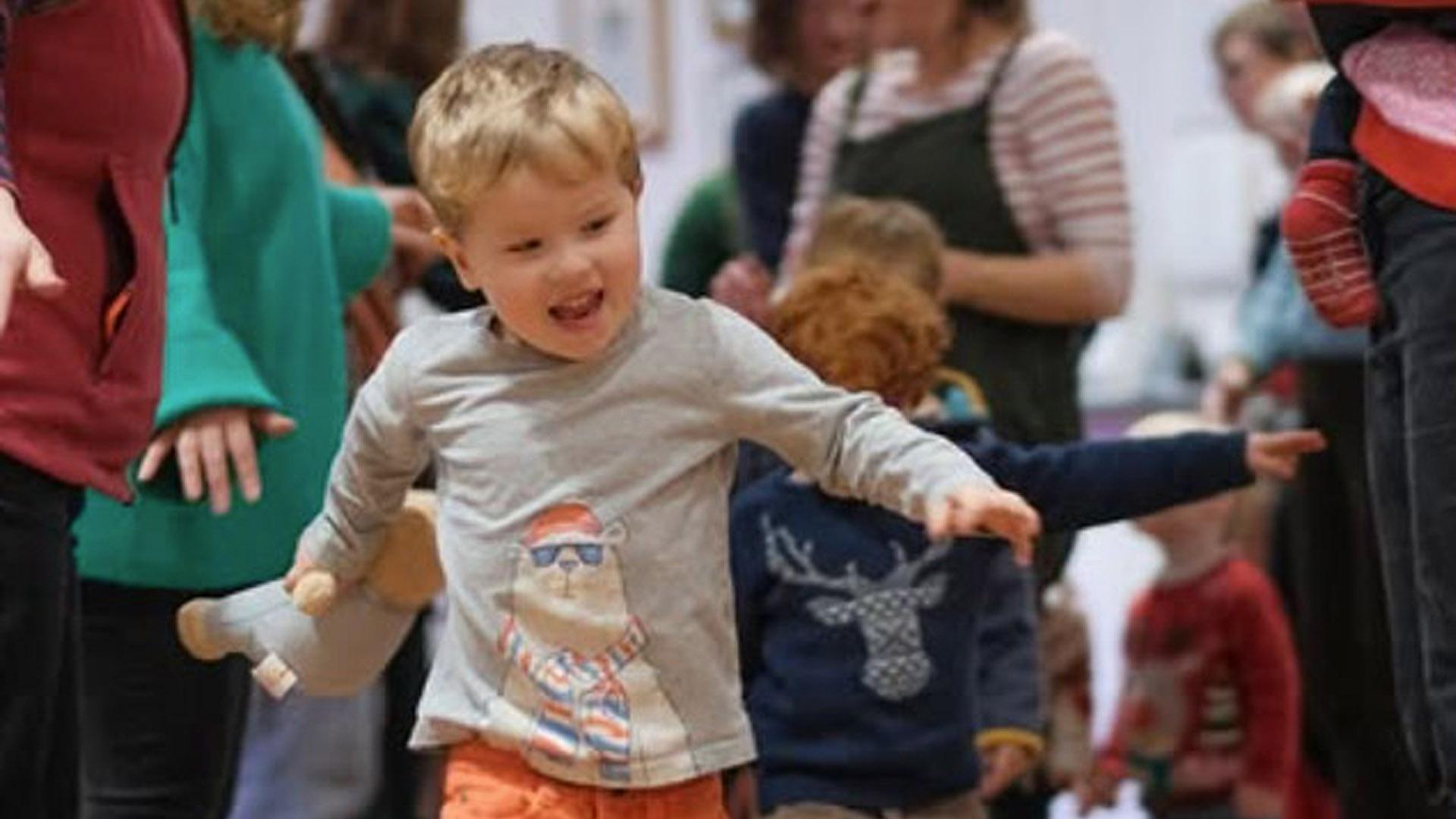 Children playing under adult supervision.