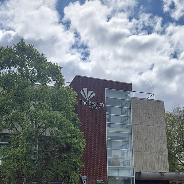 A long shot f the outside of The Beacon building.